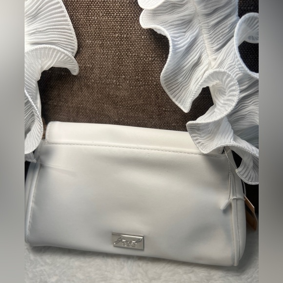 Jewel Badgley Mischka
Woman's Sophia Ruffle Me Pouch Clutch - Picture 6 of 8